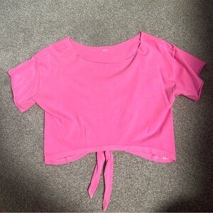 pink crop top with a knot in the back